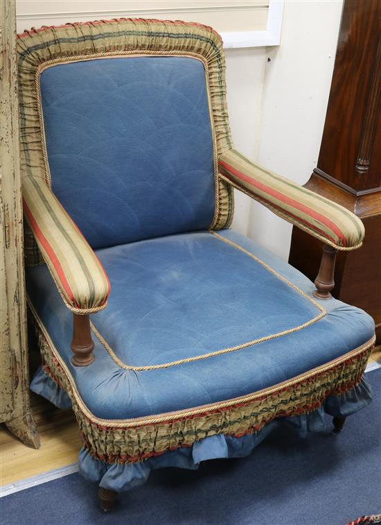 A pair of Victorian upholstered open armchairs